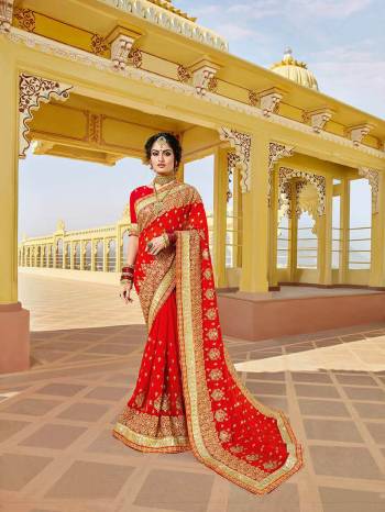 Celebrate This Festive Season With Beauty And Comfort Wearing This Attractive Looking Saree In Red Color Paired With Red Colored Blouse. This Heavy Embroidered Saree Is Fabricated On Georgette Paired With Art Silk Fabricated Blouse. Buy This Saree Now.