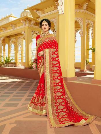 Look Attractively Beautiful In This Heavy Designer Saree In Red. This Saree Is Georgette Based Beautified With Heavy Embroidery. This Pretty Saree Is Durable And Easy To Carry Throughout The Gala.