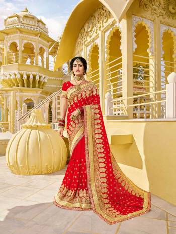 Look Attractively Beautiful In This Heavy Designer Saree In Red. This Saree Is Georgette Based Beautified With Heavy Embroidery. This Pretty Saree Is Durable And Easy To Carry Throughout The Gala.