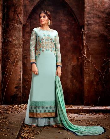 Look Pretty In This Beautiful Designer Straight Suit In All Over Aqua Blue Color. Its Top Is Georgette Based Paired With Santoon bottom And Chiffon Fabricated Dupatta. 