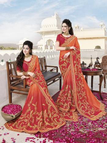 Grab This Attractive Looking Shaded Heavy Designer Saree In Shades Of Orange And Red Color Paired With Red Colored Blouse. This Saree Is Satin Based Paired With Art Silk Fabricated Blouse. It Is Easy To Drape And Durable. 