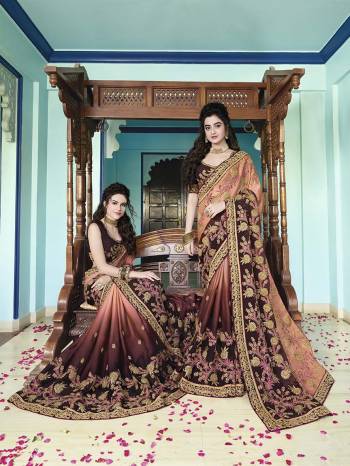 New And Unique Color Pallete Is Here With This Heavy Designer Saree In Peach And Wine Color Paired With Wine Colored Blouse. This Heavy Embroidered Saree Is Fabricated On Silk Georgette Paired With Art Silk Blouse. Its Pretty Colors And Heavy Embroidery Will Earn You Lots Of Compliments From Onlookers. 