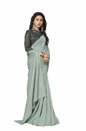 Simplicity Is The Key To Elegance, Grab This Very Pretty Simple And Elegant Looking plain Saree In Baby Blue Color Paired With Dark Blue Colored Digital Printed Blouse. Both The Saree And Blouse Are Crepe Silk Based Which also Ensures Superb Comfort all Day Long. Buy Now.