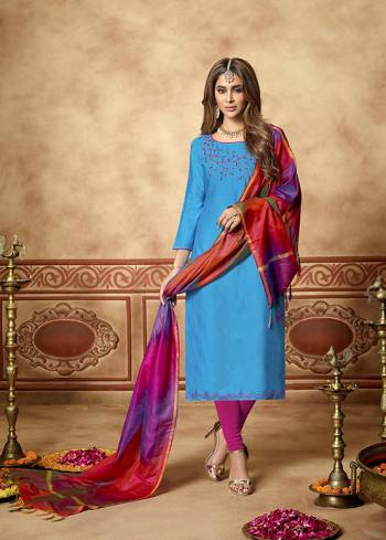 Here Is A Very Pretty Dress Material For Your Semi-Casual Wear In Blue  Color Paired With Magenta Pink Colored Bottom and Red And Purple Dupatta. Its Top Is Fabricated On Cotton Slub Paired With Cotton Bottom And Art Silk Dupatta. All Its Fabrics Ensures Superb Comfort All Day Long. 