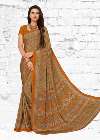 Add Some Casuals With This Pretty Saree Fabricated On Crepe. This Saree And Blouse are Beautified With prints And It Is Light Weight And Easy To Carry All Day Long. 