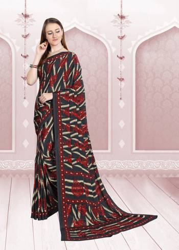 Add Some Casuals With This Pretty Saree Fabricated On Crepe. This Saree And Blouse are Beautified With prints And It Is Light Weight And Easy To Carry All Day Long. 