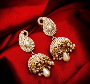 Grab This Very Pretty Pair Of Jhumka In Golden Color Beautified With Pearl Work. This Pretty Set Can Be Paired With Any Colored Ethnic Attire. Buy This Now.