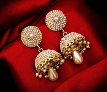 Grab This Very Pretty Pair Of Jhumka In Golden Color Beautified With Pearl Work. This Pretty Set Can Be Paired With Any Colored Ethnic Attire. Buy This Now.