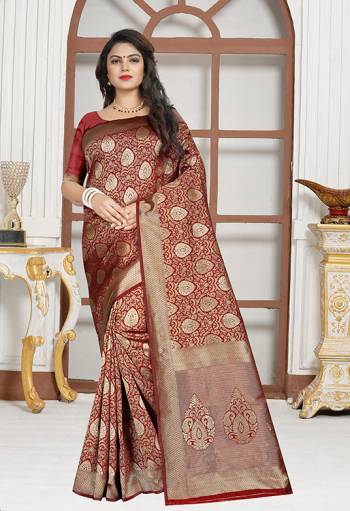 For A Royal Queen Look, Grab This Designer Silk Based Saree In Maroon Color Paierd With Maroon Colored Blouse. This Saree And Blouse Are Fabricated On Art Silk Beautified With Weave All Over. Buy This Saree Now.