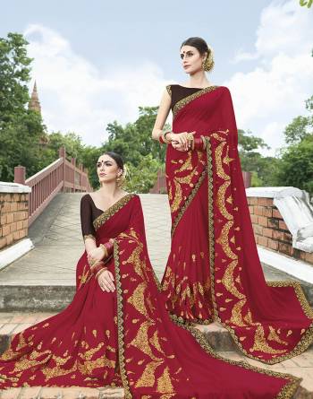 Adorn The Pretty Angelic Look Wearing This Very Beautiful Designer Saree In Red Color Paired With Brown Colored Blouse. This Saree Is Georgette Based Paired With Art Silk Fabricated Blouse. Buy Now.