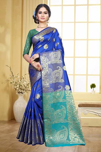 Grab This Beautiful Designer Silk Based Saree In Royal Blue Color Paired With Contrasting Sea Green Colored Blouse. This Saree And Blouse Are Fabricated On Art Silk Beeautified With Weave Motifs All Over The Saree. This Saree Is Durable, Light Weight And Easy To Carry All Day Long. 