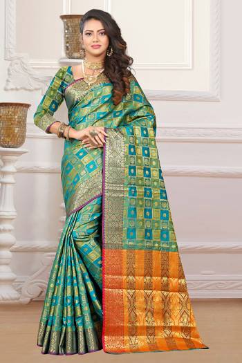 If You Have An Eye For Intricate Designs Than Grab This Very Pretty Heavy Weaved Designer Saree In Blue & Green Color Fabricated On Patola Art Silk. It Is Beautified With Weave In Checks Pattern. This Saree Is Easy To Drape And Durable. Buy Now.