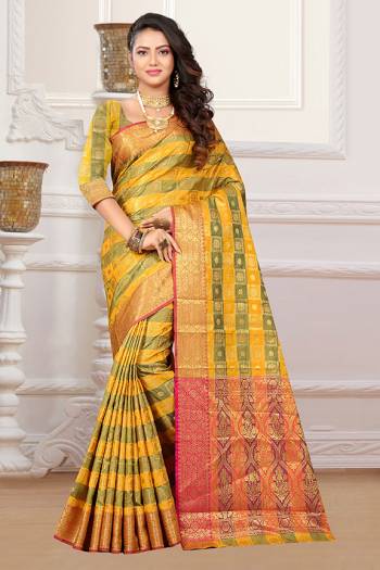 If You Have An Eye For Intricate Designs Than Grab This Very Pretty Heavy Weaved Designer Saree In Yellow And Green Color Fabricated On Patola Art Silk. It Is Beautified With Weave In Checks Pattern. This Saree Is Easy To Drape And Durable. Buy Now.