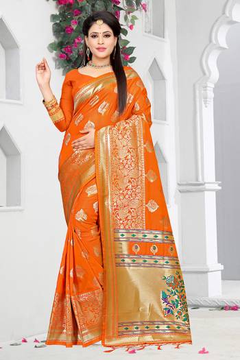 Celebrate This Festive With Traditional Colors Wearing This Pretty Saree In Orange Color Paired With Orange Colored Blouse. This Saree And Blouse are Fabricated On Art Silk Beautified With Weave All Over. Buy This Saree Now.