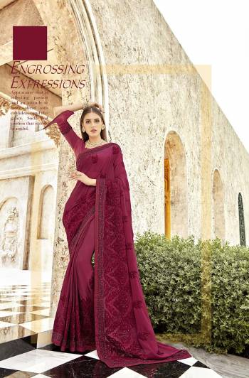 Catch All The Limelight At The Next Wedding You Attend With This Heavy Designer Saree In Magenta Pink Color Paired With Magenta Pink Colored Blouse. This Saree Is Fabricated On Georgette Paired With Art Silk Fabricated Blouse. It Is Beautified With Heavy Tone To Tone Embroidery Which Gives A Subtle Look To Your Personality.