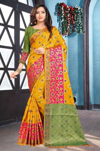 Grab This Beautiful Designer Silk Based Saree In Musturd Yellow Color Paired With Contrasting Green Colored Blouse. This Saree And Blouse Are Fabricated on Soft Silk Beautified With Weave. It Is Durable, Light Weight And Easy To Carry All Day Long. 