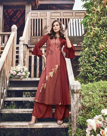 Add This Very Pretty Designer Kurti To Your Wardrobe In Maroon Color Fabricated On Modal Jacquard Which Is Soft Towards Skin And Easy To Carry All Day Long.