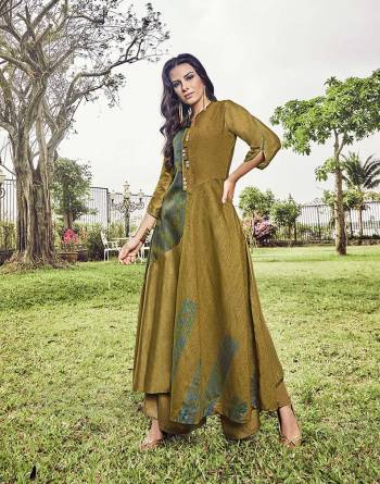 Grab This Designer Piece In Pear Green Color For The Upcoming Festive And Wedding Season. This Readymade Long Kurti Is Fabricated On Modal Jacquard Beautified With Unique Pattern, Prints And Thread Work.