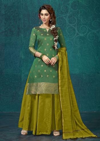 Here Is A Rich And Elegant Looking Designer Readymade Lehenga Suit Is Here In Green Color Paired With Pear Green Colored Bottom And Dupatta. Its Top IS Fabricated On Jacquard Silk Paired With Tafeta Silk Lehenga And Chanderi Silk Dupatta. Buy This Suit Now.