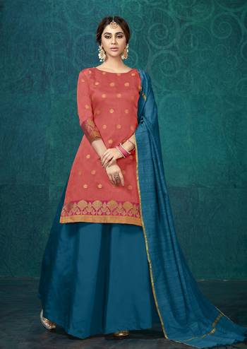 New Shade Is Here To Add Into Your Wardrobe With This Designer Lehenga Suit In Old Rose Pink Colored Top Paired With Blue Colored Bottom And Dupatta. Its Weaved Top Is Fabricated On Jacquard Silk Paired With Tafeta Silk Lehenga And Chanderi Silk Dupatta. Buy This Readymade Lehenga Suit Now.