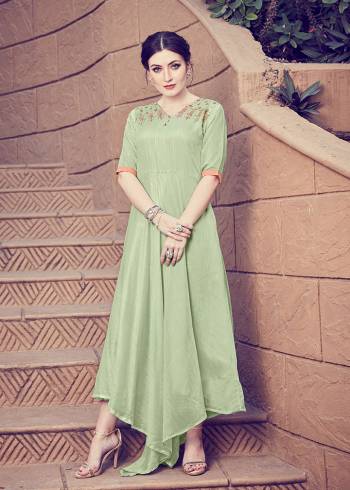 Get For The Upcoming Festive Season With This Readymade Kurti In Pastel Green Color. This Pretty Kurti Is Beautified With Minimal Hand Work And Available In All Regular Sizes. 