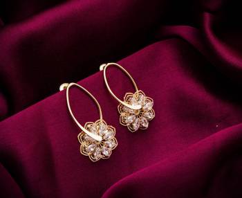 Here Is A Very Pretty Pair Of Simple And Elegant Looking Earring Set In Golden color. It Has Pretty Unique pattern With Attractive Diamond Work. You can Pair This Even With Simple Attire As Well As A Heavy One. This Pretty Evergreen Design Compliments Any Kind Of Attire You Wear. 