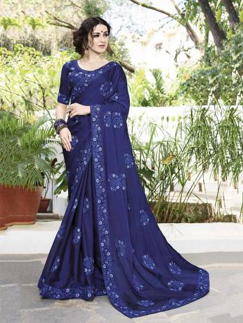 Shine Bright Wearing This Heavy Embroidered Designer Saree In Royal Blue Color Paired With Royal Blue Colored Blouse. This Saree Is Fabricated On Satin Chiffon Paired With Art Silk Fabricated Blouse. It Is Light Weight And Easy To Carry All Day Long. 