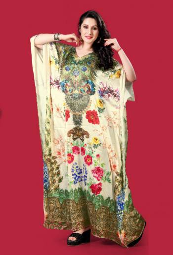 Grab this Very Beautiful Readymade Kaftan In Cream Color?Fabricated On Satin. It Is Beautified With Prints All Over With Stone Work. It Is Available In Free Size And Its Fabric Is Soft Towards Skin Which Ensures Superb Comfort All Day Long.