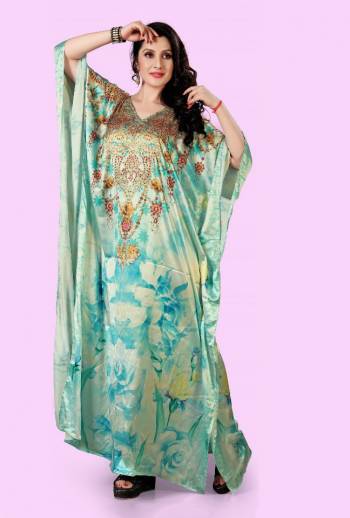 A Must Have Piece To Your Wardrobe Is Here With This Beautiful Readymade Kaftan In Light Blue Color. This Pretty Kaftan Is Fabricated on Satin beautified With Prints And Stone Work. Also It Is In Free Size Which Ensures Superb Comfort. Buy Now