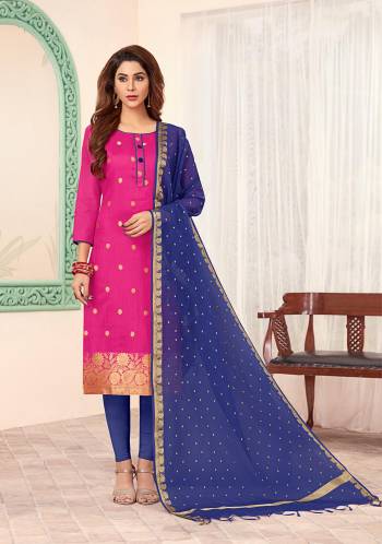 Shine Bright Wearing This Designer Dress Material In Rani Pink Colored Top Paired With Contrasting Royal Blue Colored Bottom And Dupatta. Its Top Is Silk Based Paired With Cotton Bottom And Banarasi Jacquard Dupatta. 