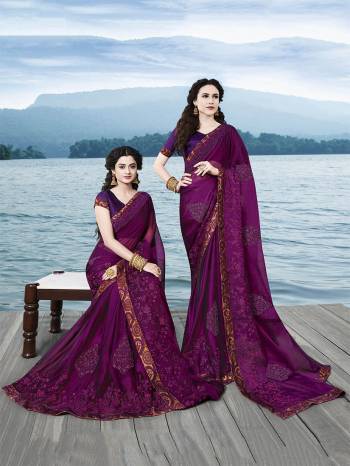 Catch All The Limelight At The Next Wedding You Attend Wearing This Heavy Designer Saree In Wine Color Paired With Wine Colored Blouse. This Saree Is Fabricated On Satin Chiffon Paired With Art Silk fabricated Blouse. It Is Beautified With Heavy Tone To Tone Embroidery Which Gives A Rich Subtle Look.