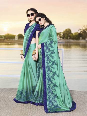 Attract All Wearing This Designer And Attractive Looking Saree In Sea Green Color Paired With Contrasting Royal Blue Colored Blouse. This Saree Is Fabricated On Satin Chiffon Paired With Art Silk Fabricated Blouse. This Saree Is Beautified With Contrasting Embroidery. Buy Now.