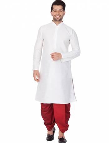 Grab This Royal Set Of Dhoti Kurta For Men's Wear In Maroon And Cream Color. This Readymade Pair Is Fabricated On Cotton Silk Which Gives A Rich Look To Your Personality. Also Its Is Available In All Sizes, Choose As Per Your Desired Fit And Comfort. Its Fabric Is Rich In Class And Durable. Buy Now.