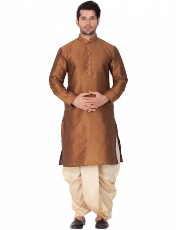 Grab This Royal Set Of Dhoti Kurta For Men's Wear In Maroon And Cream Color. This Readymade Pair Is Fabricated On Cotton Silk Which Gives A Rich Look To Your Personality. Also Its Is Available In All Sizes, Choose As Per Your Desired Fit And Comfort. Its Fabric Is Rich In Class And Durable. Buy Now.