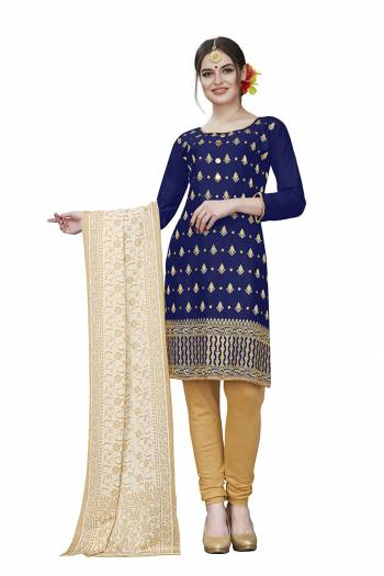 This Festive Season, Adorn A Rich, Simple And Elegant Look With This Dress Material In Navy Blue Colored Top Paired With Beige Colored Bottom And Cream Colored Dupatta. This Dress Material Is Cotton Based Beautified With Jari Embroidered Butti. Get This Stitched As Per Your Desired Fit And Comfort. 