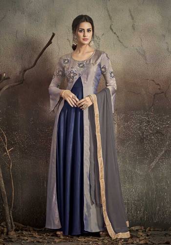 Here Is A Very Beautiful Rich And Elegant Looking Designer Readymade Floor Length Suit Is Here In Grey And Navy Blue Color. It Rich Silk Based Top Is Paired With Santoon Bottom And Chiffon Dupatta. 