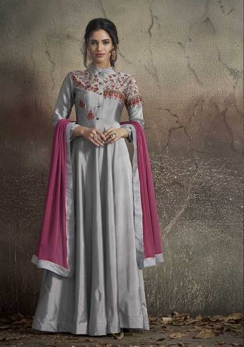 Flaunt Your Rich And Elegant Taste Wearing This Designer Readymade Floor Length Suit In Grey Colored Top And bottom Paired With Contrasting Magenta Pink Colored Dupatta. Its Top IS Fabricated On Tafeta Art Silk Paired With Santoon Bottom And Chiffon Fabricated Dupatta.