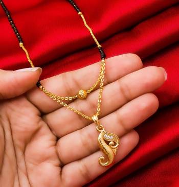 Rich And Elegant Looking Designer Double Chain Mangalsutra Is Here In Golden Color. It Is Light Weight Which Is Easy To Carry All Day Long With Any Colored Attire. Buy Now