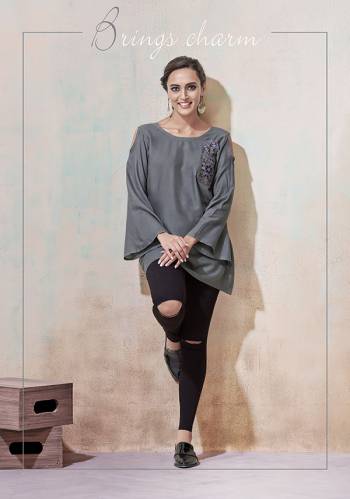 Simple And Elegant Looking Designer Readymade Top Is Here In Grey Color Fabricated On Rayon. It Is Beautified With Multi Colored Thread Work And Available In All Regular Sizes. 