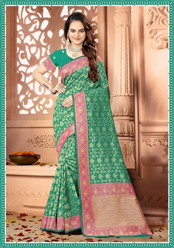 Celebrate This Festive Season Wearing This Rich And Elegant Looking Heavy Woven Saree In Sea Green Color Paired With Sea Green Colored Blouse. This Saree And Blouse are Fabricated On Art Silk Beautified With heavy Weave. Buy Now.