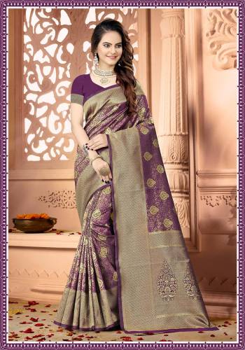 Celebrate This Festive Season Wearing This Rich And Elegant Looking Heavy Woven Saree In Purple Color Paired With Purple Colored Blouse. This Saree And Blouse are Fabricated On Art Silk Beautified With heavy Weave. Buy Now.