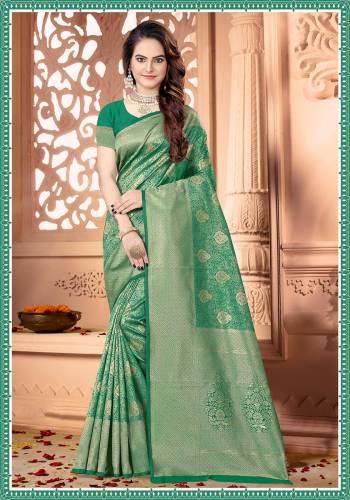 Celebrate This Festive Season Wearing This Rich And Elegant Looking Heavy Woven Saree In Green Color Paired With Green Colored Blouse. This Saree And Blouse are Fabricated On Art Silk Beautified With heavy Weave. Buy Now.