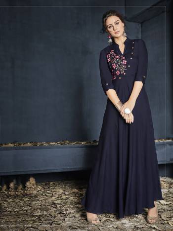 Enhance Your Personality Wearing This Readymade Designer Gown In Navy Blue Color Fabricated On Rayon.This Pretty Gown Has Pretty Thread Work Over The Yoke. It Is Light In Weight And Ensures Superb Comfort All Day Long. 