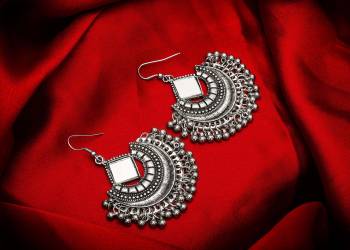 Here Is A Beautiful Collection For This Navratri With This Pretty Pair Of Earrings. It Is Light In Weight And Easy Can Be Paired With Any Colored Attire. Buy This Pretty Piece Now.