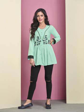 Simple And Elegant Looking Readymade Designer Top Is Here In Light Green Color Fabricated On Rayon. It IS Beautified With Thread Work Which Gives An Elegant Subtle Look. Buy This Pretty Piece Now.