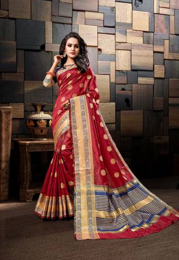 Adorn The Pretty Angelic Look InThis Designer Saree In Red Color Paired with Contrasting Royal Blue Colored Blouse. This Saree and Blouse Are Fabricated On Cotton Silk Beautified With Weave All Over. 