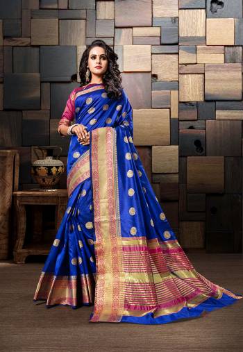 Shine Bright In This Attractive Royal Blue Colored Saree Paired With Contrasting Dark Pink Colored Blouse. This Saree And Blouse Are Cotton Silk Based Beautified With Weave. 