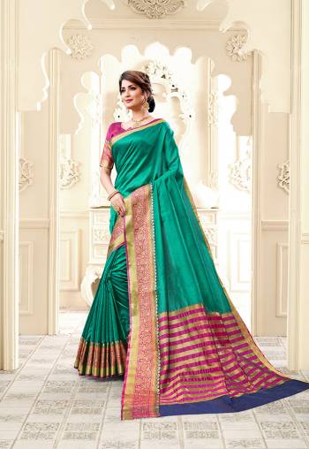 Catch All The Limelight Wearing This Designer Cotton Silk Based Saree In Sea Green Color Paired With Contrasting Rani Pink Colored Blouse. It Is Light Weight, Durable And Easy To Carry All Day Long. 