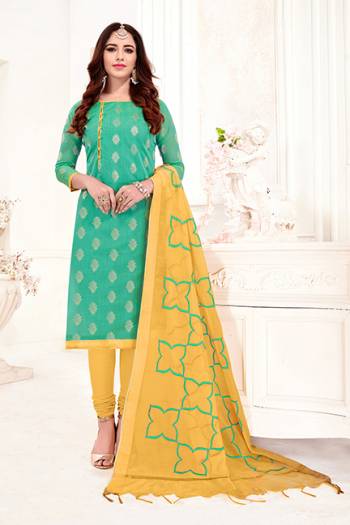 Festive Colors Are Here With This Pretty Dress Material In Sea Green Colored Top Paired With Contrasting Yellow Colored Bottom And Dupatta. Its Top Is Fabricated On Jacquard Silk Paired With Cotton Bottom and Cotton Silk Dupatta. Buy This Suit Now.