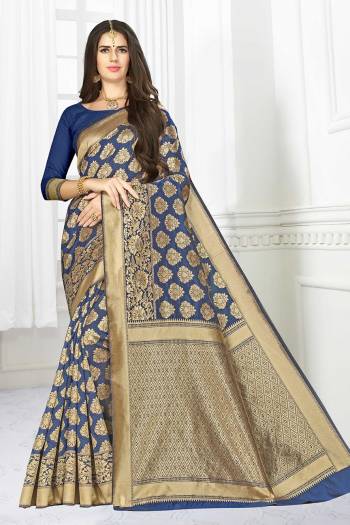 Enhance Your Personality Wearing This Designer Saree In Navy Blue?Color Paired With Navy Blue Colored Blouse. This Saree And Blouse are Fabricated On Banarasi Art Silk Beautified With Weave All Over.